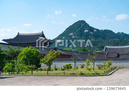Seoul, South Korea - May. 14, 2026 : Scenic landscape of Gyeongbokgung Palace with the rocky peaks of Inwangsan Mountain in early summer, Seoul, South Korea Seoul, South Korea - May. 14, 2026 : Scenic landscape of Gyeongbokgung Palace with the rocky peaks of Inwangsan Mountain in early summer, Seoul, South Korea 139673645