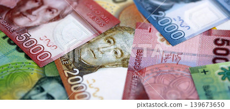 Big amount of chilean pesos moeny bills banknotes. Huge quantity of paper money Big amount of chilean pesos moeny bills banknotes. Huge quantity of paper money 139673650