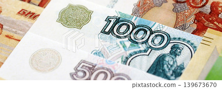 Russian ruble paper banknotes pile on table. Russia RUB currency money bills in big amount 139673670