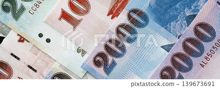 Taiwanese dollar paper banknotes pile on table. Taiwan TWD currency money bills in big amount 139673691