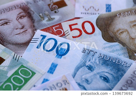 Swedish krona paper banknotes pile on table. Sweden SEK currency money bills in big amount 139673692