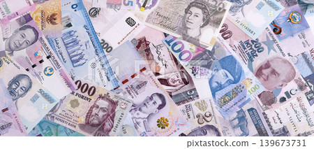 Big amount of various currencies money bills banknotes in full frame. Many cash bills Big amount of various currencies money bills banknotes in full frame. Many cash bills 139673731