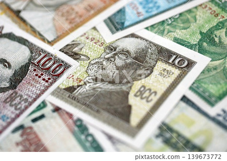 Cuban peso money bills pile on table. Cuba banknotes of CUP currency close up. Concept of business Cuban peso money bills pile on table. Cuba banknotes of CUP currency close up. Concept of business 139673772