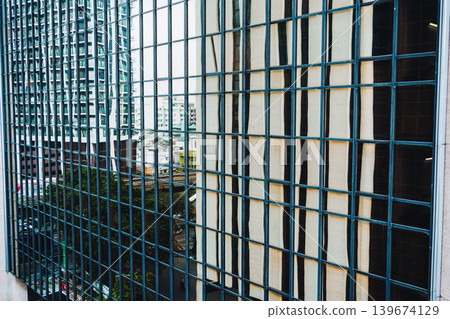 Abstract modern glass window facade office building Abstract modern glass window facade office building 139674129