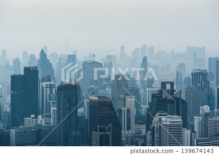 Crowded financial skyscraper in dust and smog during the morning at Bangkok 139674143