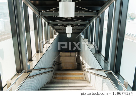 Subway entrance descending stair symmetry building Subway entrance descending stair symmetry building 139674184