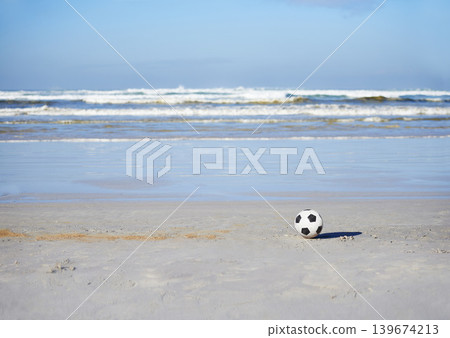 Soccer ball, sport and games for holiday at beach, outdoor fun and recreation in summer on vacation. Celebrate, playing or leisure on travel by sea, freedom or football competition in brazil by ocean Soccer ball, sport and games for holiday at beach, outdoor fun and recreation in summer on vacation. Celebrate, playing or leisure on travel by sea, freedom or football competition in brazil by ocean 139674213