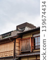 Heron bird perched on roof of traditional house in Kyoto, Japan 139674434