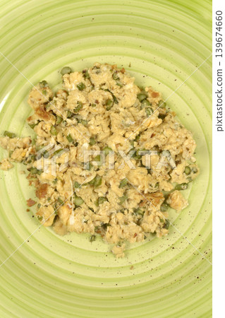 Scrambled Eggs with Asparagus on a Green Plate 139674660