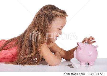 Girl child, piggy bank and coins for saving, studio or thinking with smile for investing by white background. Confused kid, container or animal toys for money, cash or happy for financial education Girl child, piggy bank and coins for saving, studio or thinking with smile for investing by white background. Confused kid, container or animal toys for money, cash or happy for financial education 139674723