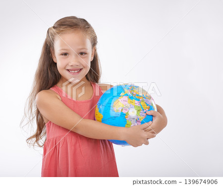 Child, portrait and world globe for education school learning in studio for Geography, continents or white background. Girl, student and planet for class studying Earth population, travel or mockup Child, portrait and world globe for education school learning in studio for Geography, continents or white background. Girl, student and planet for class studying Earth population, travel or mockup 139674906