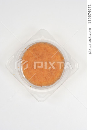 Top View of Round Breaded Camembert Cheese in Plastic Packaging Top View of Round Breaded Camembert Cheese in Plastic Packaging 139674971