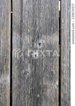 Old weathered grey wooden planks texture Old weathered grey wooden planks texture 139674977