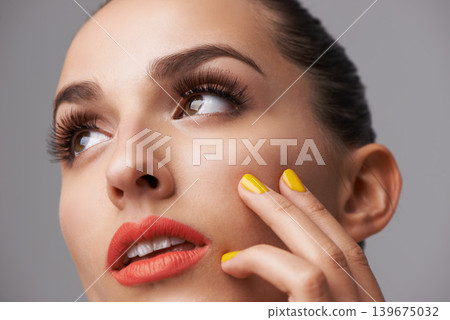 Face, makeup and thinking with manicure of woman in studio isolated on gray background for cosmetology. Beauty, lipstick and cosmetics with confident young model closeup for luxury or cosmetic nails Face, makeup and thinking with manicure of woman in studio isolated on gray background for cosmetology. Beauty, lipstick and cosmetics with confident young model closeup for luxury or cosmetic nails 139675032