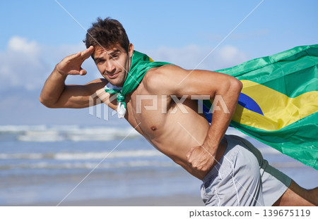 Man, portrait and Brazilian flag on beach for patriotic pride or outdoor support for Country, nationality or nature. Male person, face and hand salute at ocean for holiday, vacation or citizenship Man, portrait and Brazilian flag on beach for patriotic pride or outdoor support for Country, nationality or nature. Male person, face and hand salute at ocean for holiday, vacation or citizenship 139675119
