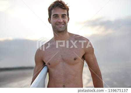 Beach, happy and portrait of man with surfboard for waves on summer vacation, weekend and holiday by sea. Surfing, nature and face of person by ocean for water sports, adventure and fun in Australia Beach, happy and portrait of man with surfboard for waves on summer vacation, weekend and holiday by sea. Surfing, nature and face of person by ocean for water sports, adventure and fun in Australia 139675137