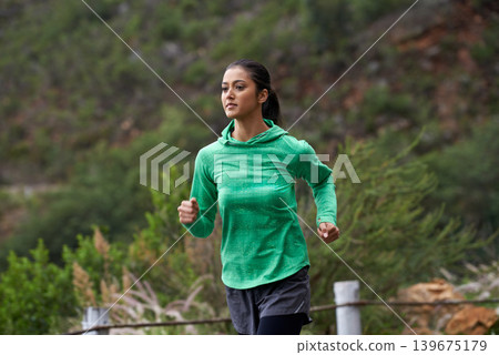 Wellness, road and running with woman, fitness and morning with fresh air and exercise for health, training and cardio. Person, runner or athlete with workout or endurance with nature or challenge Wellness, road and running with woman, fitness and morning with fresh air and exercise for health, training and cardio. Person, runner or athlete with workout or endurance with nature or challenge 139675179