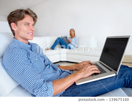 Happy man, laptop and sofa on mockup screen for remote work, email or networking in relax at home. Male person or freelancer thinking on computer for communication, connectivity or idea on couch 139675180