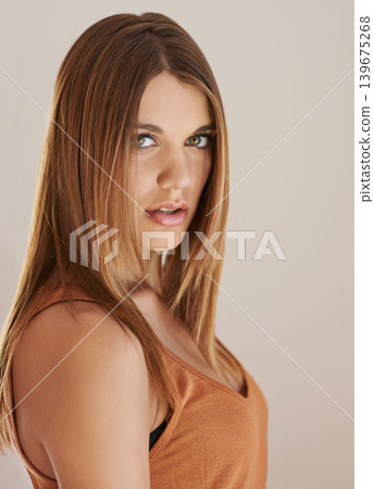 Woman, portrait and beauty cosmetics in studio for self care or skin treatment wellness, style or makeup. Female person, face and model on brown background for mockup space, hair confidence or health Woman, portrait and beauty cosmetics in studio for self care or skin treatment wellness, style or makeup. Female person, face and model on brown background for mockup space, hair confidence or health 139675268