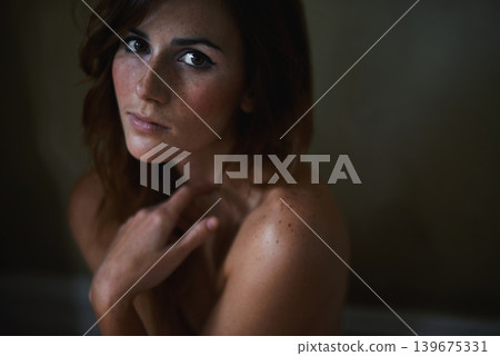 Cosmetic, hair care and portrait of woman in studio with natural, salon or beauty treatment. Health, wellness and young female person with salon hairstyle routine isolated by black background. Cosmetic, hair care and portrait of woman in studio with natural, salon or beauty treatment. Health, wellness and young female person with salon hairstyle routine isolated by black background. 139675331