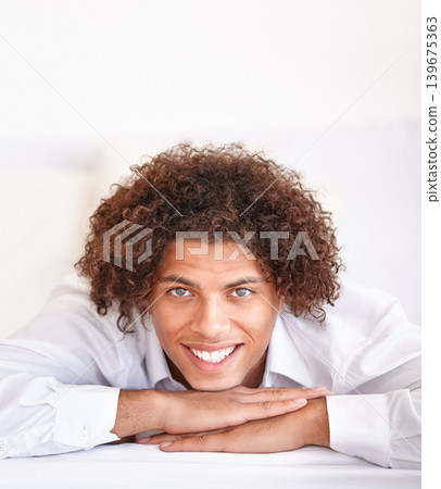 Man, portrait and happy relaxing in bed on weekend, comfortable and lazy or resting in apartment. Male person, face and smiling in bedroom and calm or peace on holiday or vacation in Amsterdam Man, portrait and happy relaxing in bed on weekend, comfortable and lazy or resting in apartment. Male person, face and smiling in bedroom and calm or peace on holiday or vacation in Amsterdam 139675363