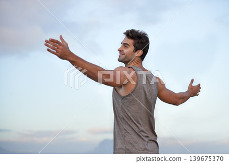 Sky, happy and excited with man, vacation and journey with wellness and freedom with adventure. Person, outdoor and guy with arms raised, peace and happiness with holiday and adventure with smile Sky, happy and excited with man, vacation and journey with wellness and freedom with adventure. Person, outdoor and guy with arms raised, peace and happiness with holiday and adventure with smile 139675370