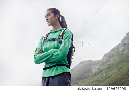 Arms crossed, hiking and woman with fitness, thinking and mountains with exercise and fresh air. Person, girl and hiker with wellness, nature and training for health and active with hobby and workout Arms crossed, hiking and woman with fitness, thinking and mountains with exercise and fresh air. Person, girl and hiker with wellness, nature and training for health and active with hobby and workout 139675398