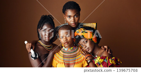 African women, group and studio for culture with face, jewelry or beads necklace in clothes by background. Black people, model and indigenous fashion for friends, traditional or portrait for kwanzaa African women, group and studio for culture with face, jewelry or beads necklace in clothes by background. Black people, model and indigenous fashion for friends, traditional or portrait for kwanzaa 139675708