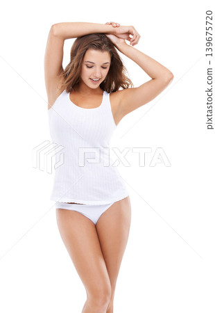 Confidence, underwear or happy woman in tank top with smile, beauty or healthy body in studio. Natural, fashion model or female person in lingerie with pride or wellness isolated on white background 139675720