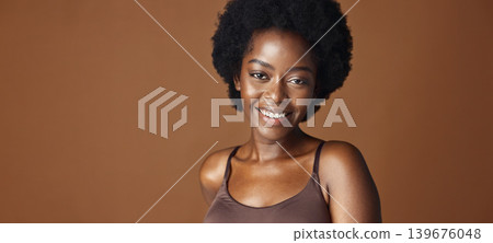 Face of black woman, afro model or natural beauty for wellness, cosmetics or healthy skin in studio. Dermatology, pride or serious African person with glow or skincare results on brown background Face of black woman, afro model or natural beauty for wellness, cosmetics or healthy skin in studio. Dermatology, pride or serious African person with glow or skincare results on brown background 139676048