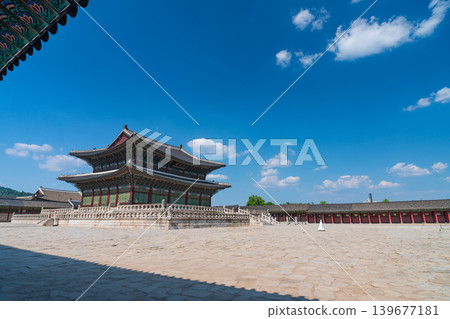 Seoul, South Korea - May. 14, 2026 : Historical Geunjeongjeon Hall in Gyeongbokgung Palace under a blue sky with white clouds, Seoul, South Korea Seoul, South Korea - May. 14, 2026 : Historical Geunjeongjeon Hall in Gyeongbokgung Palace under a blue sky with white clouds, Seoul, South Korea 139677181