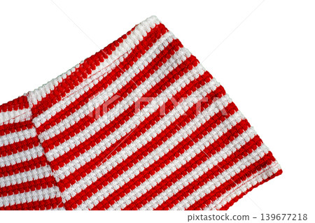 Red and white striped knitted fabric on white background Red and white striped knitted fabric on white background 139677218