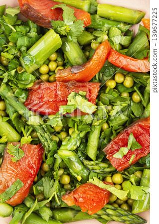 Fresh asparagus salad with smoked salmon, close up. Fresh asparagus salad with smoked salmon, close up. 139677225