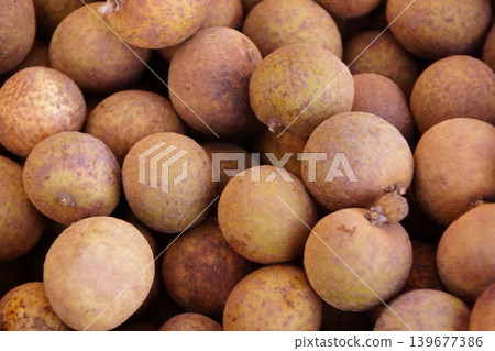 A mountain of longan in a Hawaiian market A mountain of longan in a Hawaiian market 139677386