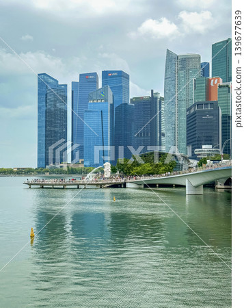 Panoramic view of Singapore from Marina Bay, a complete overview of modern skyscrapers, Singapore's iconic cityscape Panoramic view of Singapore from Marina Bay, a complete overview of modern skyscrapers, Singapore's iconic cityscape 139677639