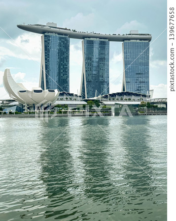 Panoramic view of Marina Bay Sands and the lotus-shaped ArtScience Museum building, Singapore skyline Panoramic view of Marina Bay Sands and the lotus-shaped ArtScience Museum building, Singapore skyline 139677658
