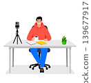 Man blogger sitting at office desk 139677917