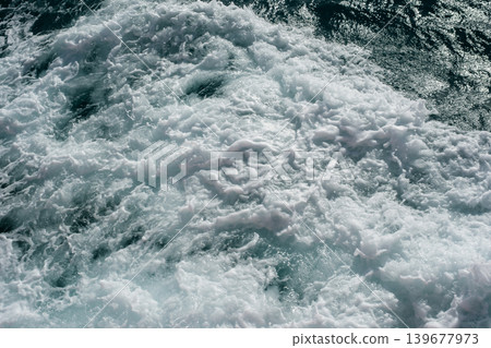 Dynamic ocean waves capturing nature's energy and raw power in motion Dynamic ocean waves capturing nature's energy and raw power in motion 139677973