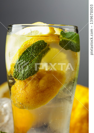 Carbonated refreshing drink with fresh lemon, ice and mint. Carbonated refreshing drink with fresh lemon, ice and mint. 139678003