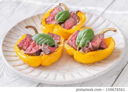 Roasted Yellow Bell Peppers Stuffed With Cream Cheese And Juicy Steak Slices Roasted Yellow Bell Peppers Stuffed With Cream Cheese And Juicy Steak Slices 139678561