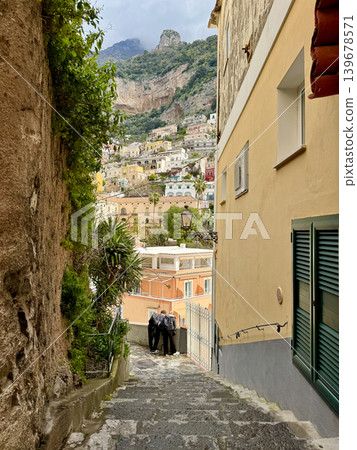 Narrow street view with sea and beach in Positano Italy Narrow street view with sea and beach in Positano Italy 139678571