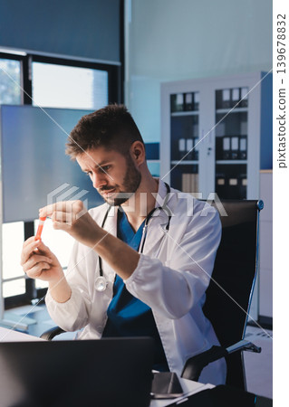 Attractive student of chemistry working in laboratory Attractive student of chemistry working in laboratory 139678832