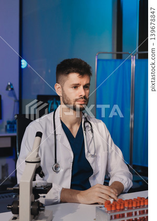Attractive student of chemistry working in laboratory Attractive student of chemistry working in laboratory 139678847