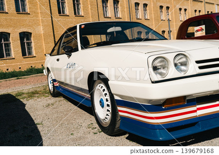 Berlin, Germany - May 2, 2026: White Retro Sports Coupe at Car Show 139679168