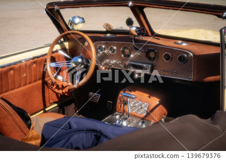 Berlin, Germany - May 2, 2026: Yellow Vintage Convertible Interior 139679376