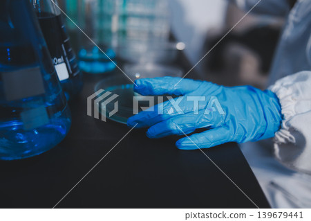 Researchers working in the clinical laboratory Researchers working in the clinical laboratory 139679441