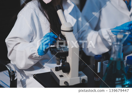 Researchers working in the clinical laboratory Researchers working in the clinical laboratory 139679447