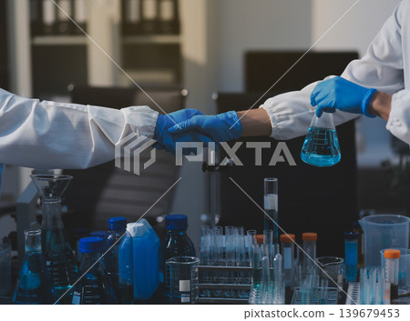 Researchers working in the clinical laboratory 139679453