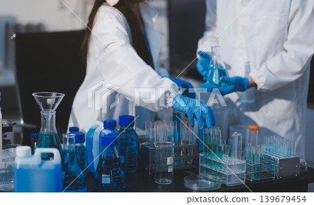 Researchers working in the clinical laboratory Researchers working in the clinical laboratory 139679454