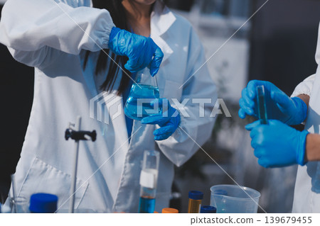 Researchers working in the clinical laboratory Researchers working in the clinical laboratory 139679455